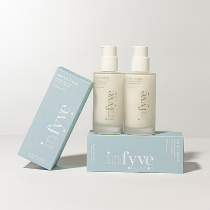 DAILY.DOSE INFYVE set skincare con flaconi e packaging